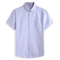 Camisa masculina com fechamento em botões e manga curta, modelagem que se adapta em qualquer corpo.